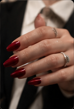 Client with deep red manicure